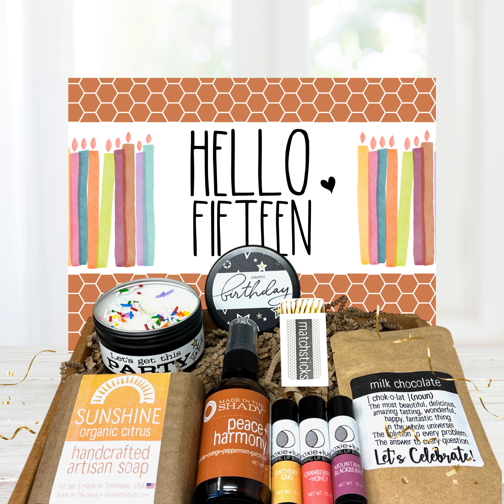 15 year old girl birthday Gift set with candles and soap on a white background