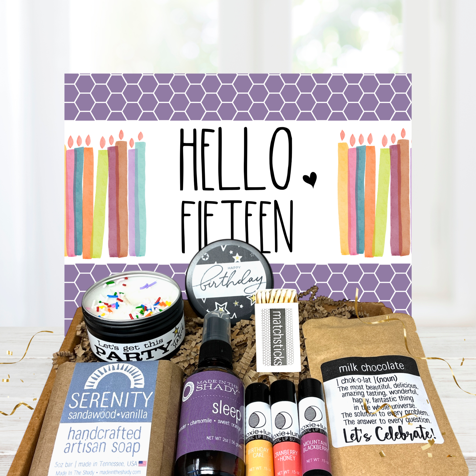 15 year girl Birthday gift set with candles, soap, and other items on a white background